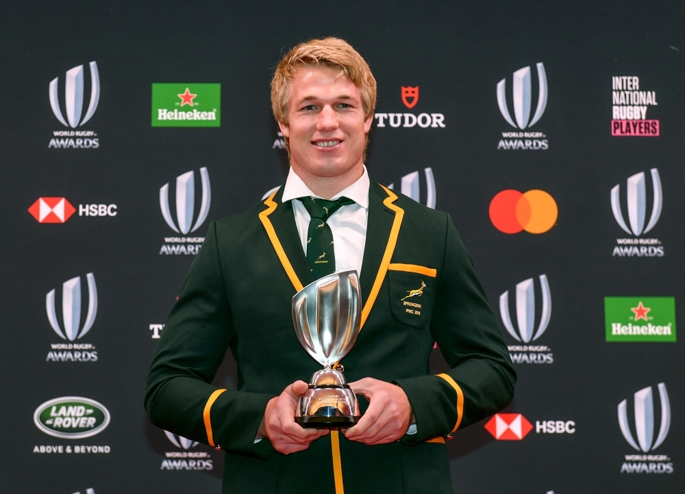 World Rugby Men’s 15s Player of the Year award winner Pieter-Steph du Toit of South Africa poses with the trophy following the World Rugby Awards 2019 ceremony in Tokyo, on Sunday. — AFP