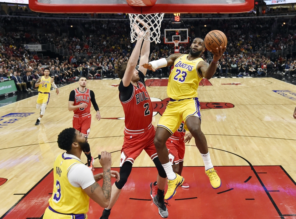 Los Angeles Lakers forward LeBron James (23) shoots a layup in the first half against Chicago Bulls forward Luke Kornet (2) at United Center, Chicago, IL, USA on Tuesday. — Reuters