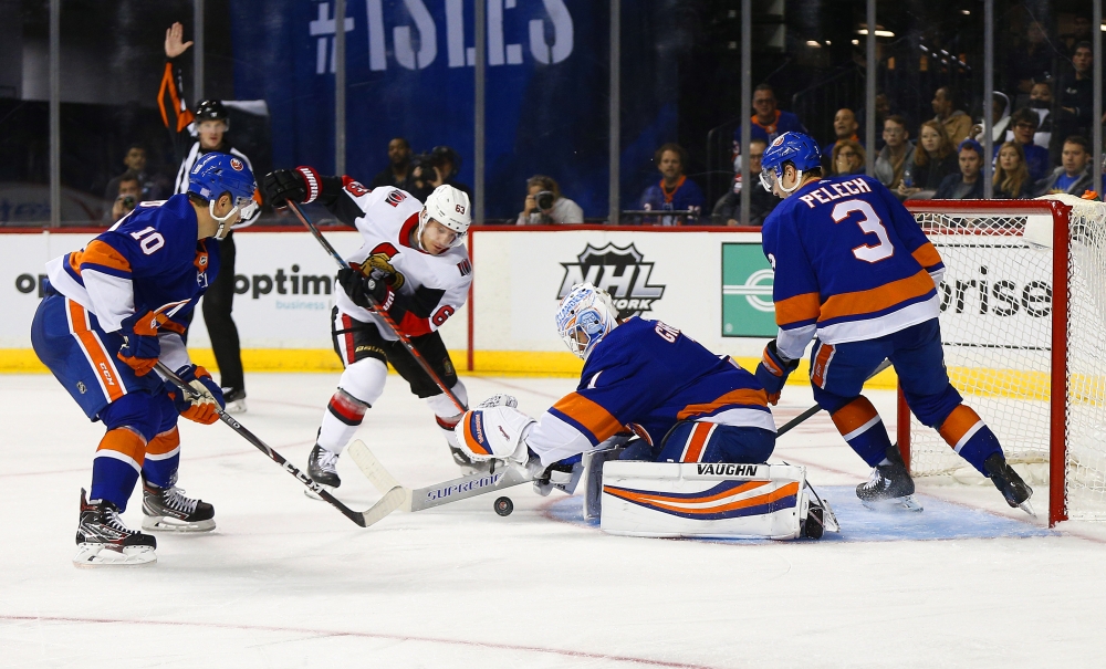 New York Islanders goaltender Thomas Greiss (1) makes a save on a shot by Ottawa Senators center Tyler Ennis (63) during the third period at Barclays Center, Brooklyn, NY, USA on Tuesday. — Reuters