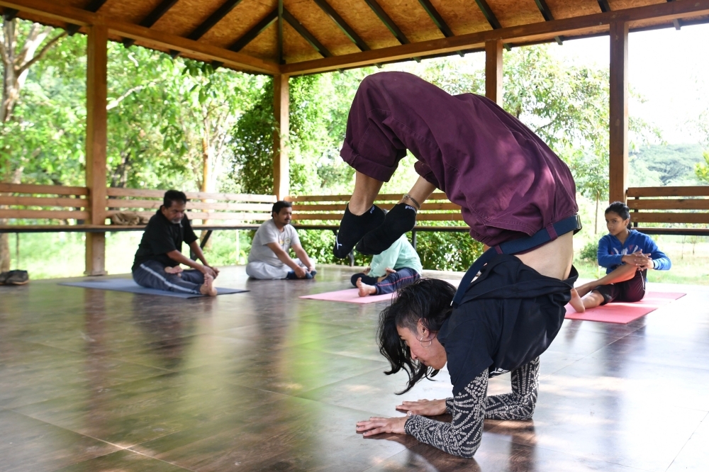 Breakdancer Johanna Rodrigues performs a dance routine as part of her daily practice session at a park in Bangalore, India, in this Oct. 28, 2019 file photo. — FP