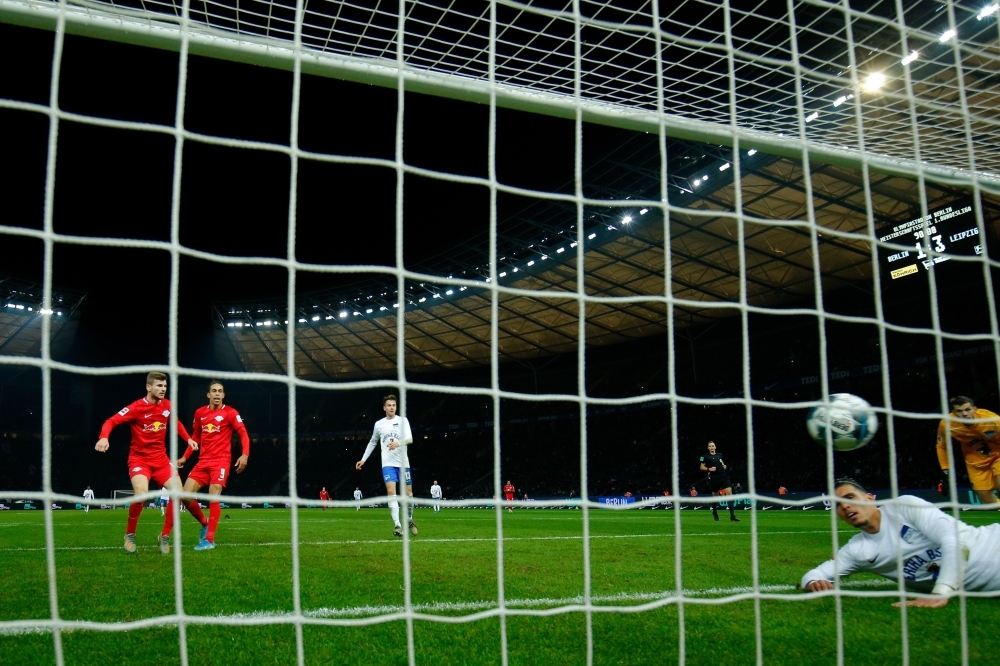 Leipzig's German forward Timo Werner (L) scores during the German first division Bundesliga football match Hertha BSC Berlin v RB Leipzig, at the Olymic Stadium in Berlin on Saturday. — AFP