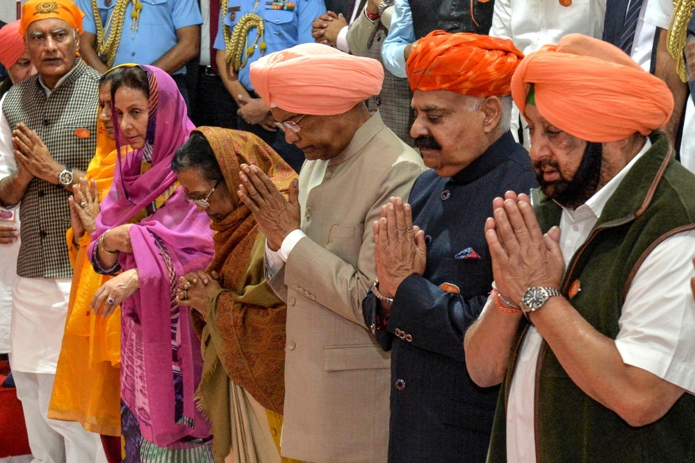 India's President Ram Nath Kovind, center, pays obeisance at Gurudwara Ber Sahib in Sultanpur Lodhi in north Indian state of Punjab on Tuesday. — AFP