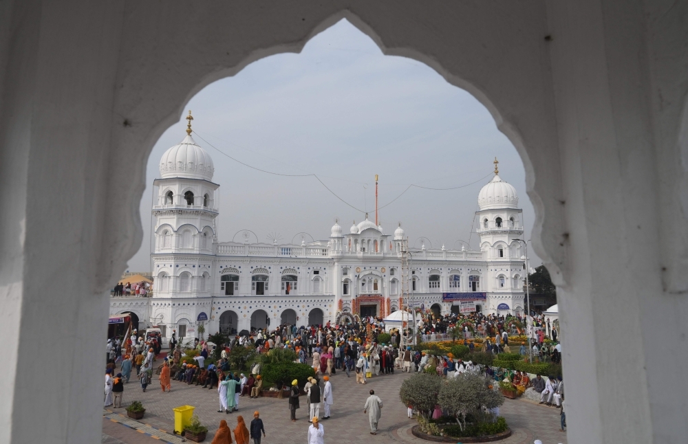 India's President Ram Nath Kovind, center, pays obeisance at Gurudwara Ber Sahib in Sultanpur Lodhi in north Indian state of Punjab on Tuesday. — AFP