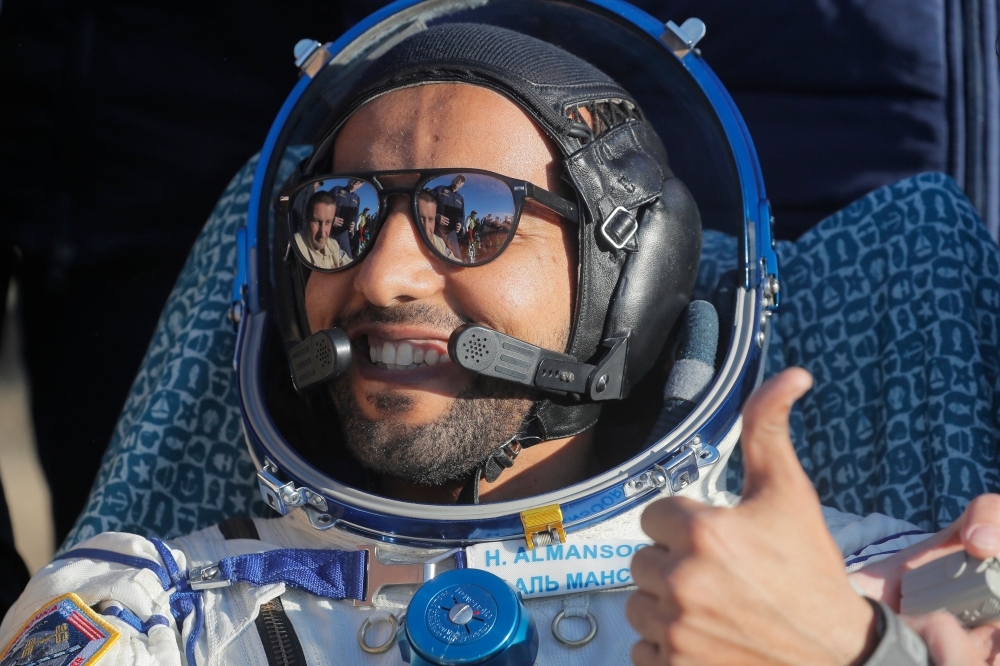 United Arab Emirates astronaut Hazzaa Al-Mansoori gives the thumbs-up shortly after the landing of the Russian Soyuz MS-12 space capsule about 150 km (90 miles) south-east of the Kazakh town of Dzhezkazgan in this Oct. 3, 2019 file photo. — AFP