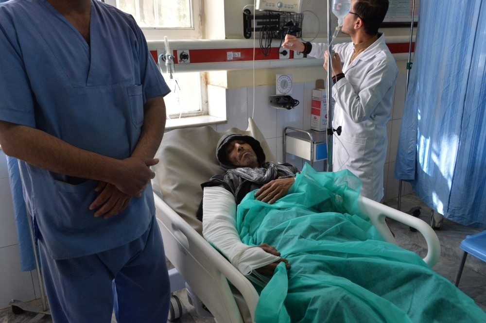 A wounded man receives treatment at Wazir Akbar Khan hospital following a suicide attack in Kabul on Wednesday. -AFP 