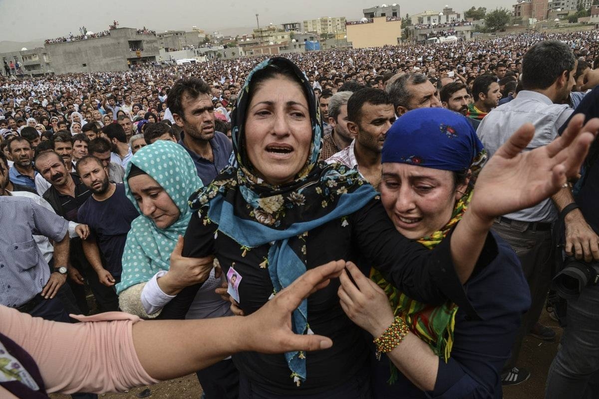 Kurdish mourners attend a funeral for people killed by Turkish forces in this file photo. — AFP