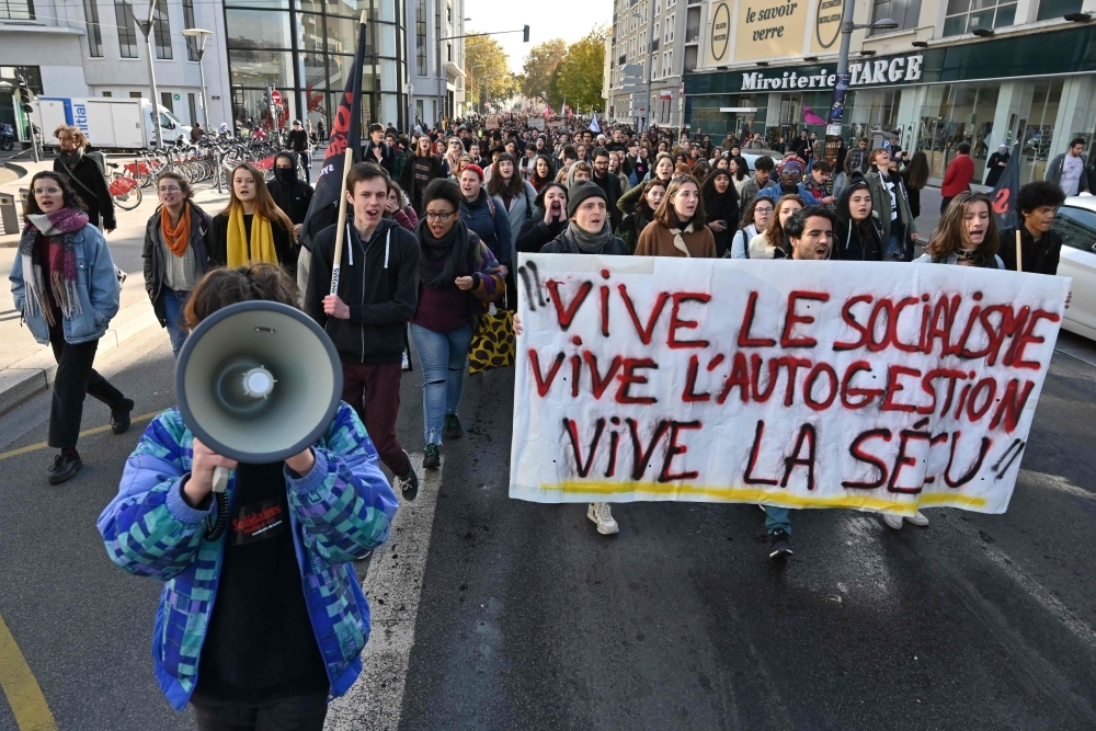 Students take part in a demonstration in Lyon on Tuesday called by French students union Solidaires days after a 22-year-old student set himself on fire over financial problems. — AFP