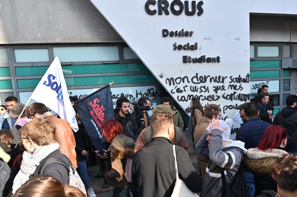 Students take part in a demonstration in Lyon on Tuesday called by French students union Solidaires days after a 22-year-old student set himself on fire over financial problems. — AFP