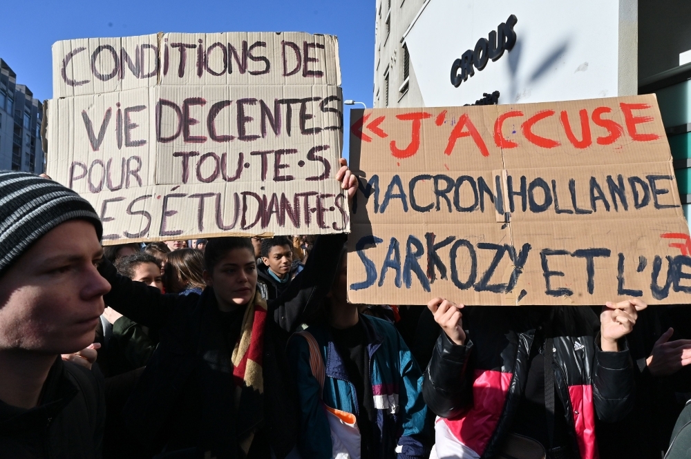 Students take part in a demonstration in Lyon on Tuesday called by French students union Solidaires days after a 22-year-old student set himself on fire over financial problems. — AFP