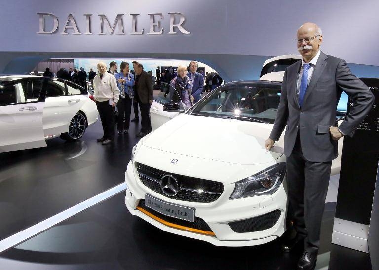 Dieter Zetsche, ex-CEO of German auto giant Daimler AG, poses next to a CLA-Shooting-Brake car prior to his company's annual general meeting, in Berlin, in this April 1, 2015 file photo. — AFP