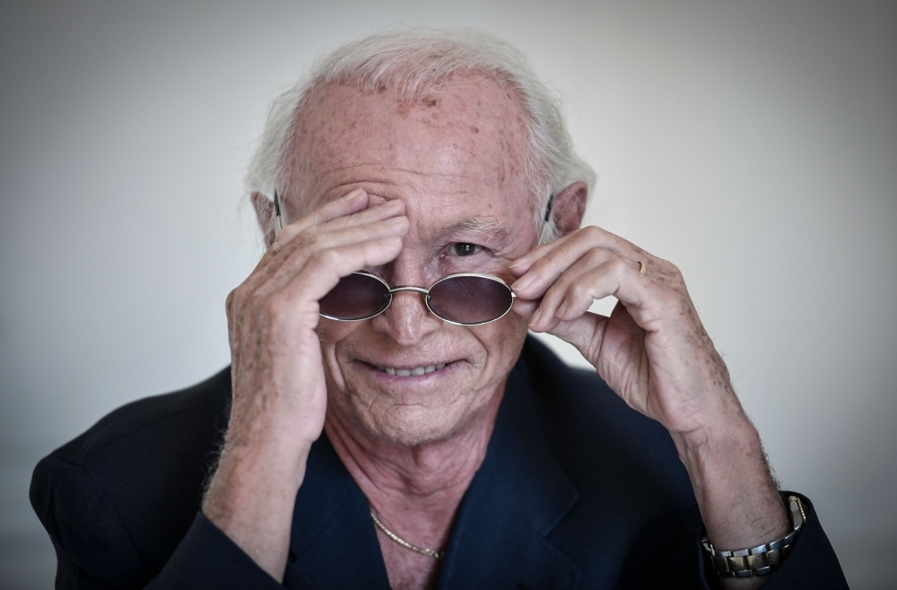 French composer Jacques Revaux poses during a photo session at the Raphael Hotel in Paris on Nov. 12, 2019. — AFP