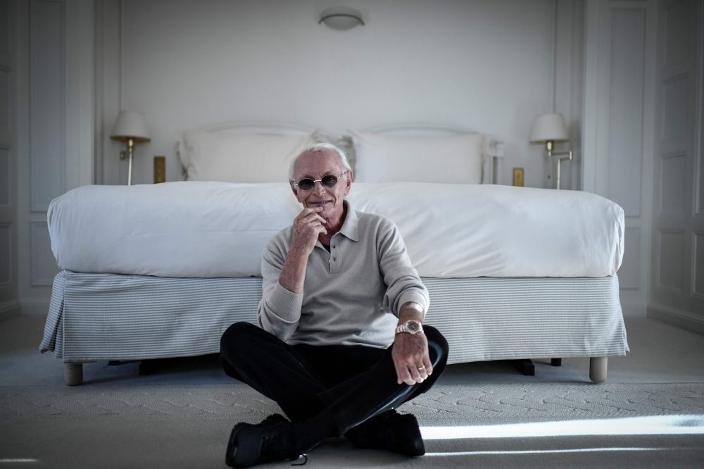 French composer Jacques Revaux poses during a photo session at the Raphael Hotel in Paris on Nov. 12, 2019. — AFP