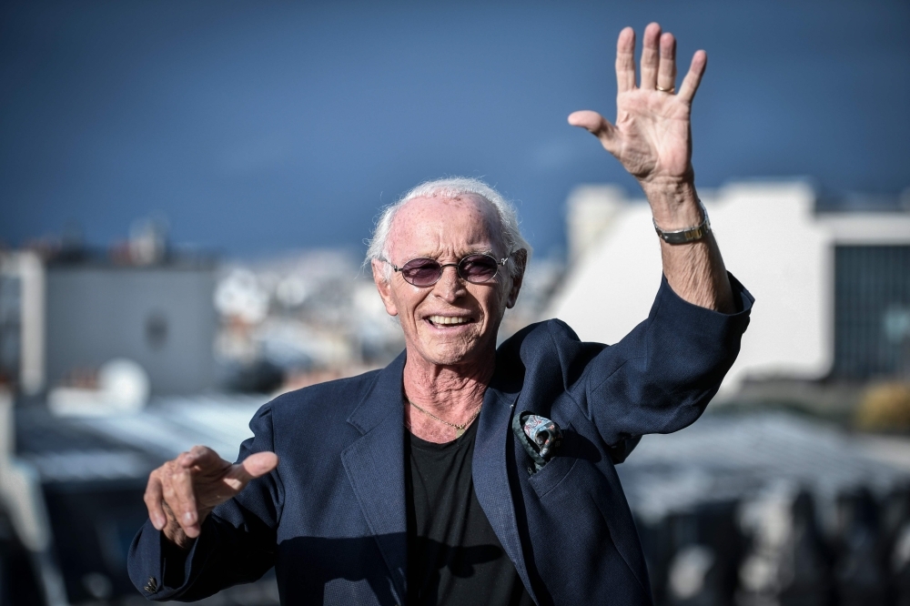 French composer Jacques Revaux poses during a photo session at the Raphael Hotel in Paris on Nov. 12, 2019. — AFP