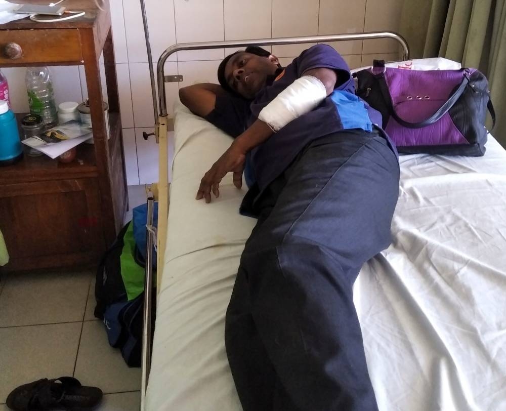 Sri Lankan writer Lasantha Wijeratne receives treatment in a hospital in Galle on Thursda, after being stabbed by armed men. — AFP