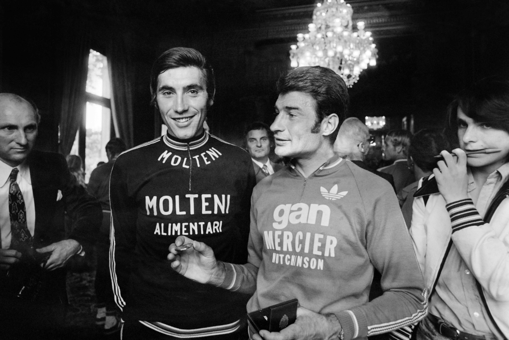 In this file photo taken on Sept. 5, 1978 former French Bicycle racer Raymond Poulidor (R) and François Gadot-Clet, French CEO of Manufrance, French Arms and Cycle Factory of St. Etienne, offer a bike to young girl Christine Donna, in Clermont Ferrand. Poulidor died on Nov. 13, 2019 aged 83, his family announced. — AFP 