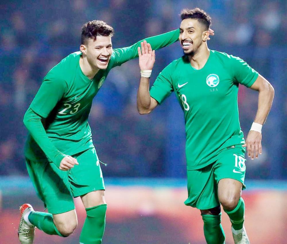 Saudi players rejoice after defeating Uzbekistan in Group D of the Asian Qualifiers on Thursday in Tashkent. 