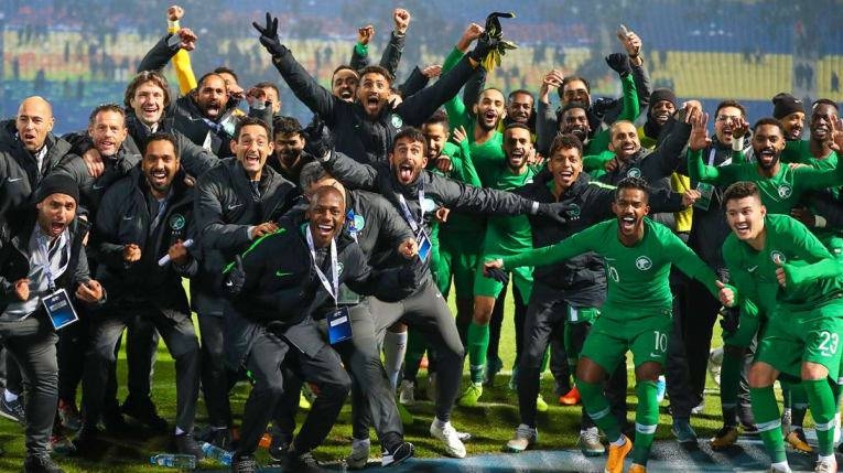 Saudi players rejoice after defeating Uzbekistan in Group D of the Asian Qualifiers on Thursday in Tashkent. 