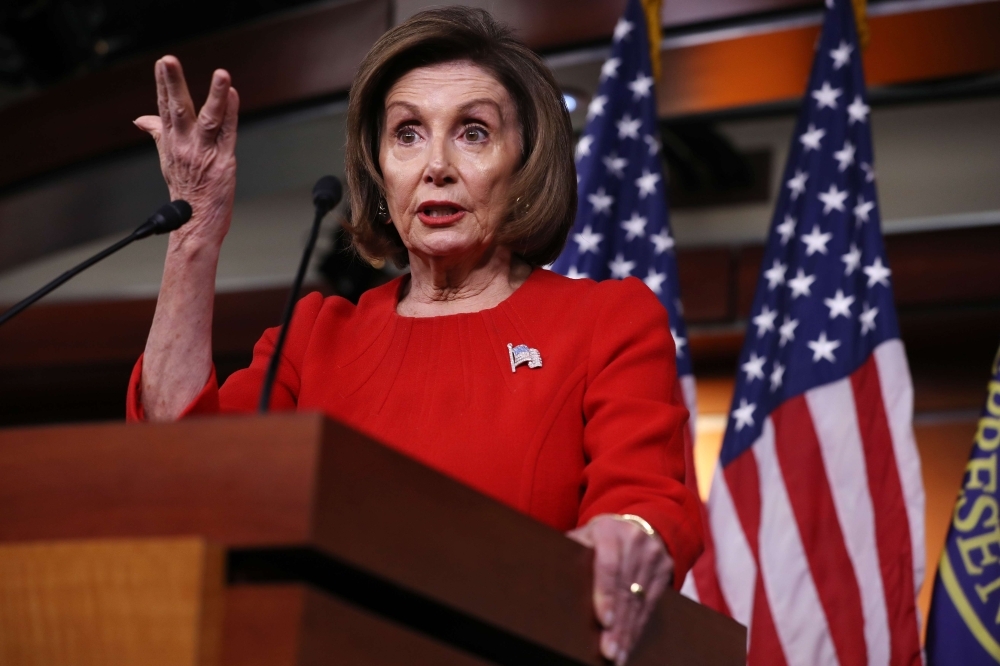 Speaker of the House Nancy Pelosi (D-CA) holds her weekly news conference in the House Visitors Center at the US Capitol thursday in Washington, DC. Pelosi faced questions from reporters as public hearings in the impeachment inquiry of President Donald Trump began this week. — AFP
