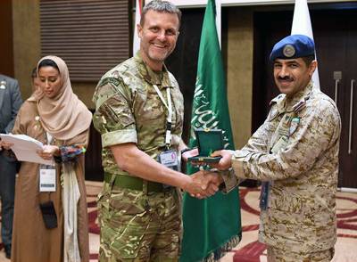 A participant in the 1st KSA-UK Workshop on Stabilisation with Saudi Royal Air Force Gen. Abdullah Alhababi (right) in Riyadh on Thursday.