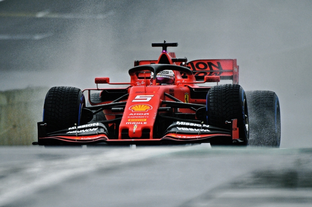 German F1 driver Sebastian Vettel powers his Ferrari at the Interlagos racetrack in Sao Paulo, Brazil, on Friday, during the first free practice for the Brazilian Formula One GP, to take place on November 17. — AFP