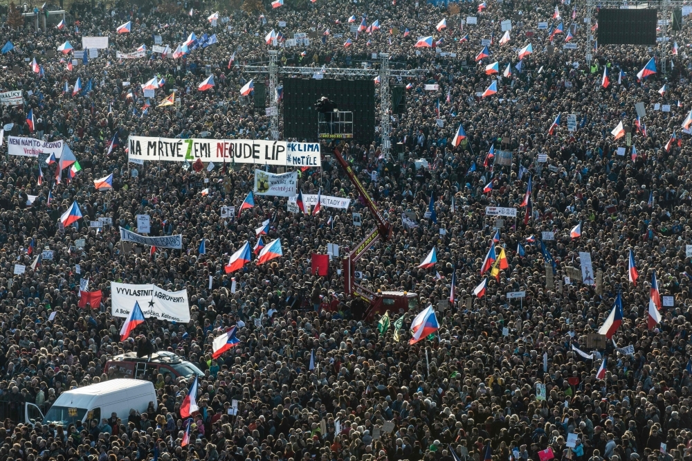 People attend a protest in Prague against Czech Prime Minister Andrej Babis on eve of Velvet Revolution anniversary on Saturday. -AFP