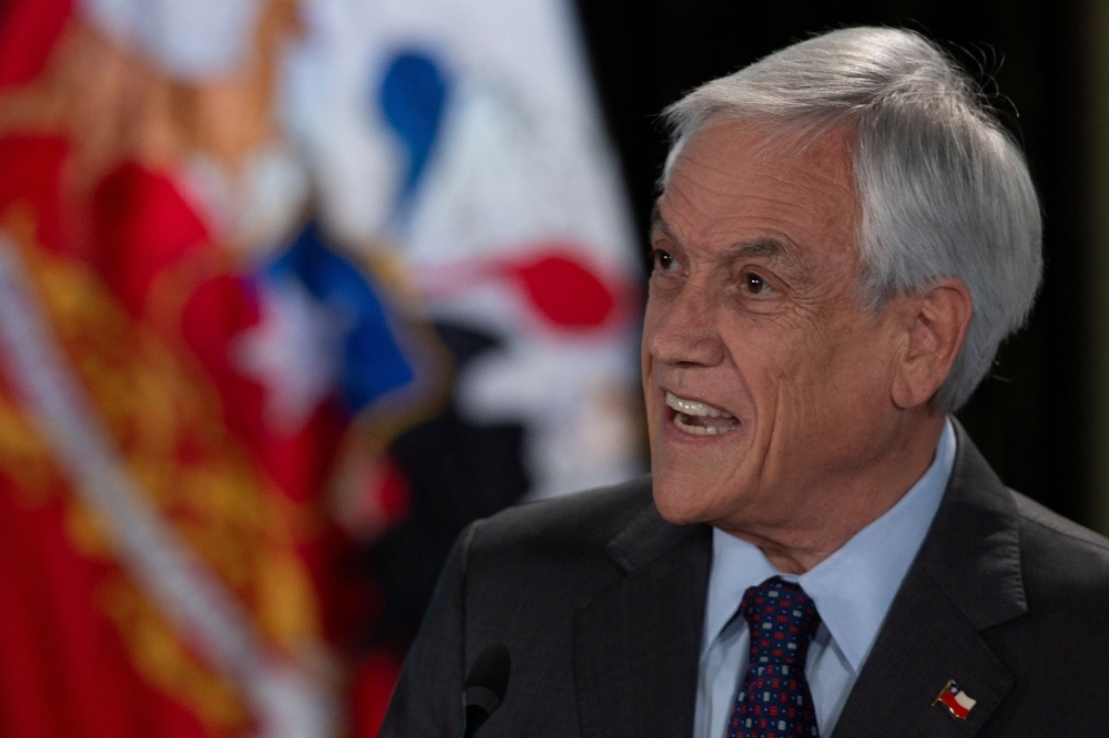 Chilean President Sebastian Pinera addresses the nation in Santiago, on Sunday. -AFP