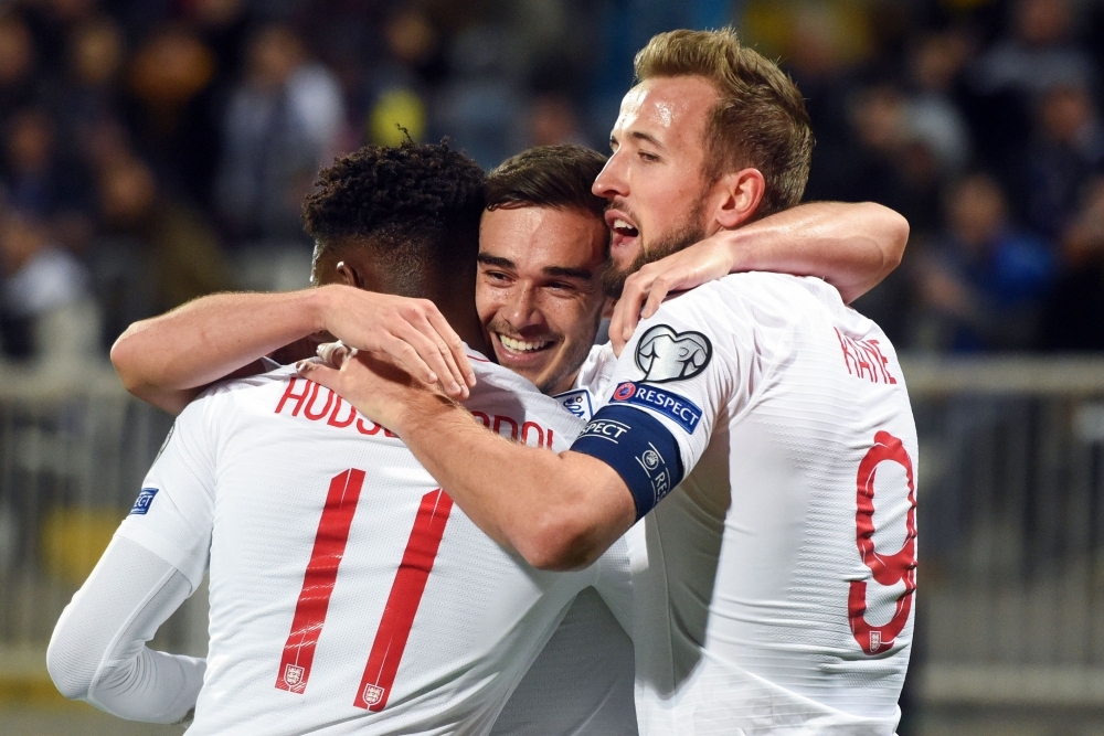 England's Harry Winks (C) celebrates with teammates after scoring a goal during the UEFA Euro 2020 qualifying Group A football match between Kosovo and England in Prishtina on Sunday. — AFP