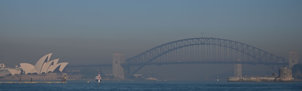 Smoke from bushfires blanket Sydney on Tuesday. -AFP