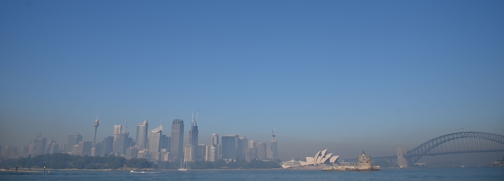 Smoke from bushfires blanket Sydney on Tuesday. -AFP