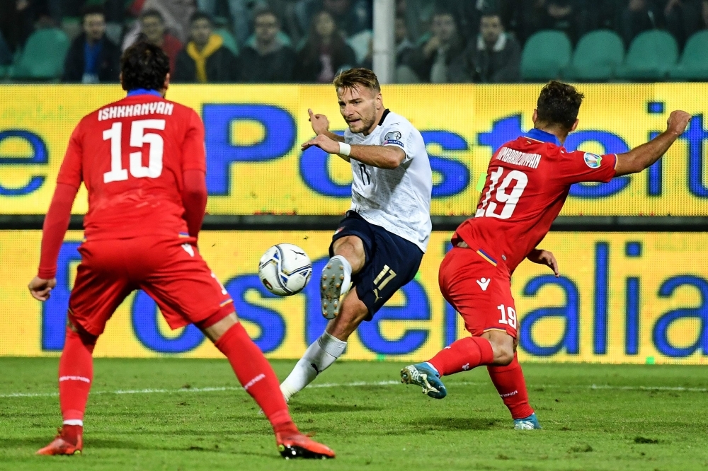 Italy's forward Ciro Immobile (C) shoots on goal during the Euro 2020 1st round Group J qualifying football match Italy v Armenia at the Renzo-Barbera stadium in Palermo on Monday. — AFP