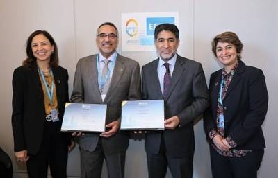 Dr. Hani Jokhdar, deputy minister for public health, receivs the 