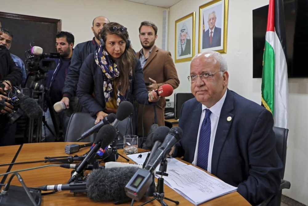 Saeb Erekat, Secretary General of the Palestine Liberation Organization (PLO) and chief Palestinian negotiator, speaks during a press conference in the Palestinian West Bank city of Ramallah on Tuesday. -AFP