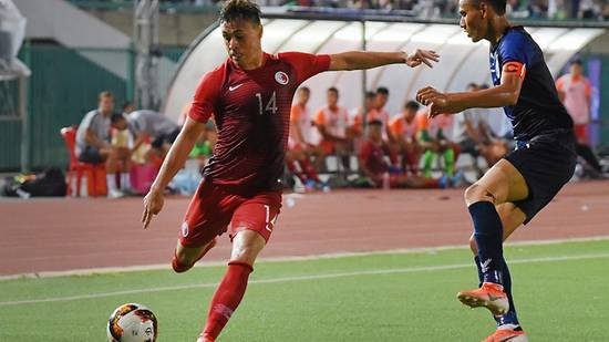 Hong Kong's James Stephen Gee Ha controls the ball next to Cambodia's Soeuy Visal during the Qatar 2022 World Cup qualifying football match between Cambodia and Hong Kong in Phnom Penh in this Sep 5, 2019 file photo. — AFP 