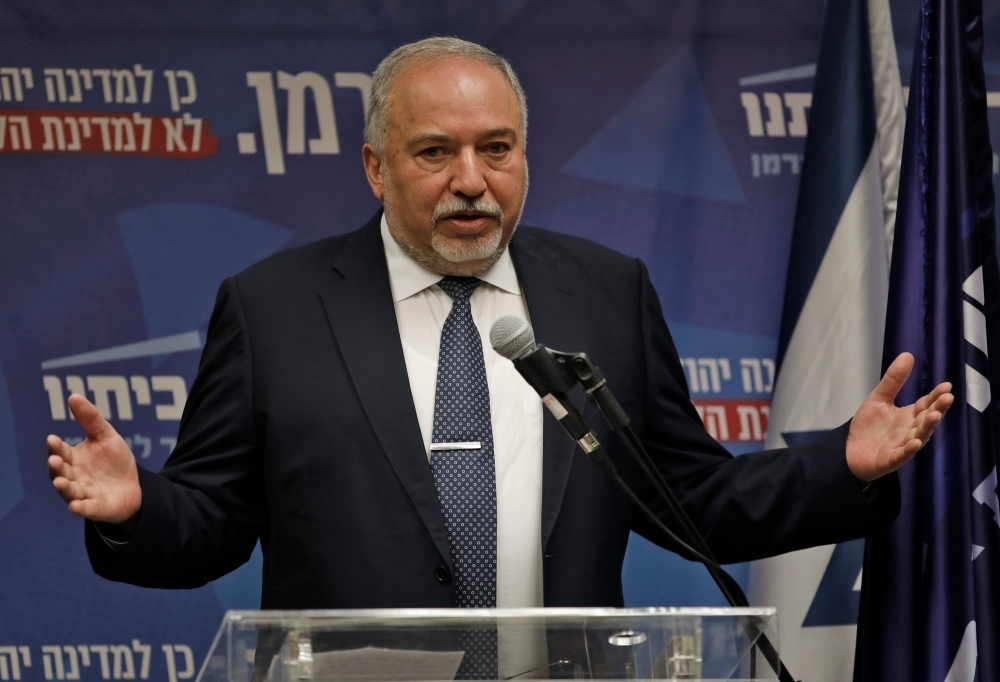 Yisrael Beitenu's party head Avigdor Lieberman delivers a statement to the press on November 20, 2019 in Jerusalem as the deadline for Iserael's opposition to form Israeli government ends. A coalition government or new elections? Israeli Prime Minister Benjamin Netanyahu and rival Benny Gantz traded blame over faltering talks Wednesday ahead of a midnight deadline. Former military general Gantz has until 11:59 pm (2159 GMT) to cut a coalition deal, or the country will edge closer to holding a third round of elections in a year.
 / AFP / Menahem KAHANA
