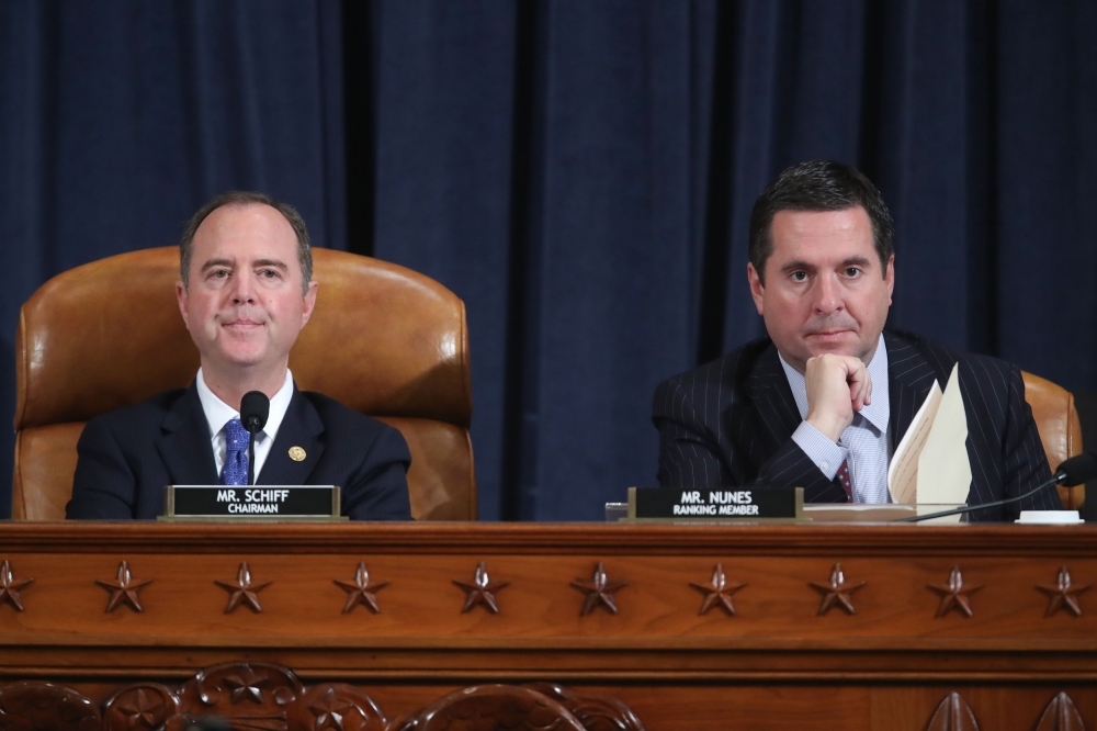 House Intelligence Committee ranking member Rep. Devin Nunes, right, is flanked by Chairman Adam Schiff at a House Intelligence Committee hearing featuring witness US Ambassador to the European Union Gordon Sondland testifying as part of the impeachment inquiry into US President Donald Trump on Capitol Hill in Washington on Wednesday. — AFP