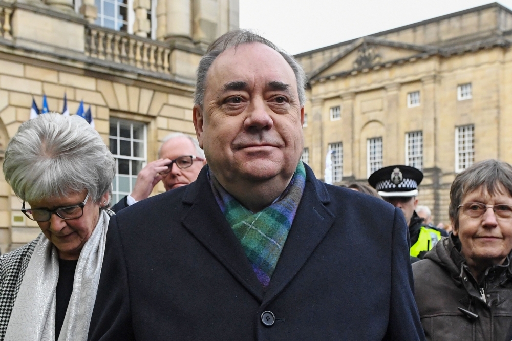 Former Scottish first minister and pro-independence figurehead Alex Salmond leaves a preliminary hearing over allegations of sexual harassment, at the High Court in Edinburgh on Thursday. — AFP