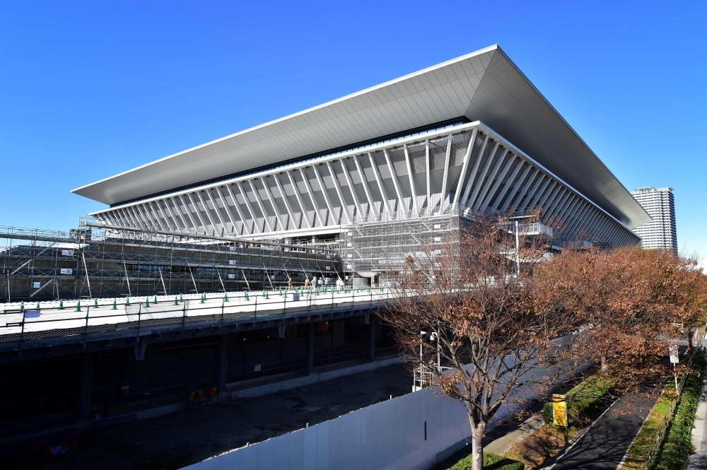 This picture shows a general view of the construction site of the Olympic Aquatics Center, venue for the swimming competitions in the upcoming Tokyo 2020 Olympic Games, in Tokyo on November 21, 2019.  Tokyo 2020 organizers Thursday unveiled the $523 million venue for swimming, diving and artistic swimming that will seat 15,000 fans for the Olympic and Paralympic Games next year. — AFP