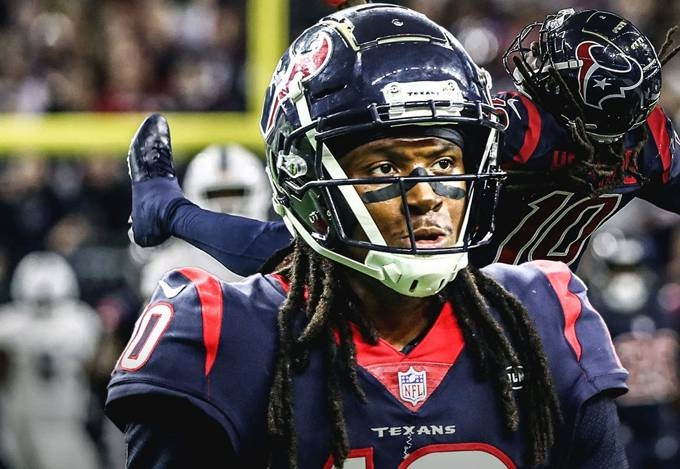Texan DeAndre Hopkins pulls in his second TD catch against Colts, as Houston downs Indianapolis in a NFL encounter on Friday.