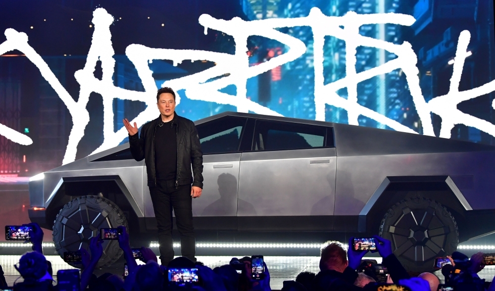 Tesla co-founder and CEO Elon Musk gestures while wrapping up his presentation of the newly unveiled all-electric battery-powered Tesla Cybertruck at Tesla Design Center in Hawthorne, California, on Thursday. — AFP