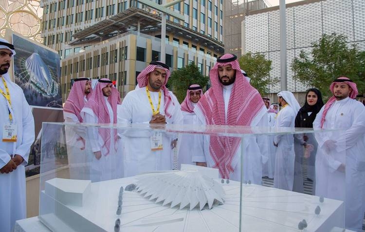 Crown Prince Muhammad Bin Salman, deputy premier and minister of defense, and UAE Vice President and Prime Minister and Dubai Ruler Sheikh Mohammed Bin Rashid are greeted by officials at the Zabeel Palace on Thursday.