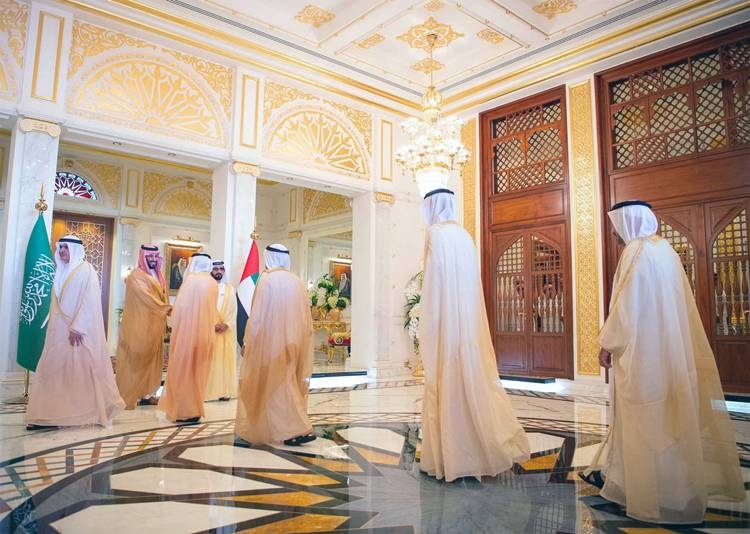 Crown Prince Muhammad Bin Salman, deputy premier and minister of defense, and UAE Vice President and Prime Minister and Dubai Ruler Sheikh Mohammed Bin Rashid are greeted by officials at the Zabeel Palace on Thursday.