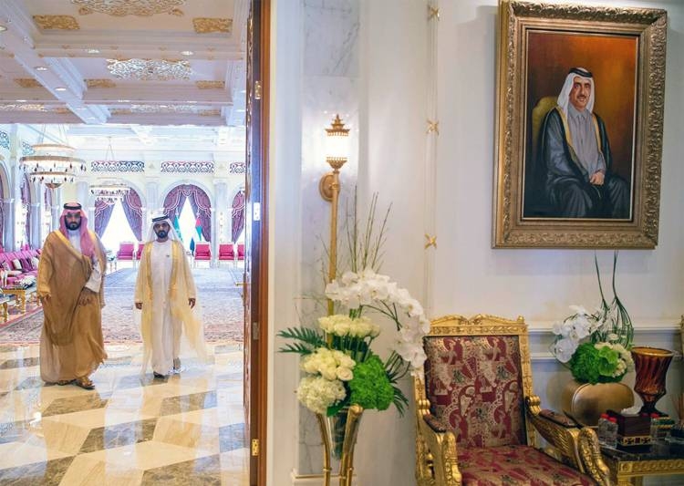 Crown Prince Muhammad Bin Salman, deputy premier and minister of defense, and UAE Vice President and Prime Minister and Dubai Ruler Sheikh Mohammed Bin Rashid are greeted by officials at the Zabeel Palace on Thursday.