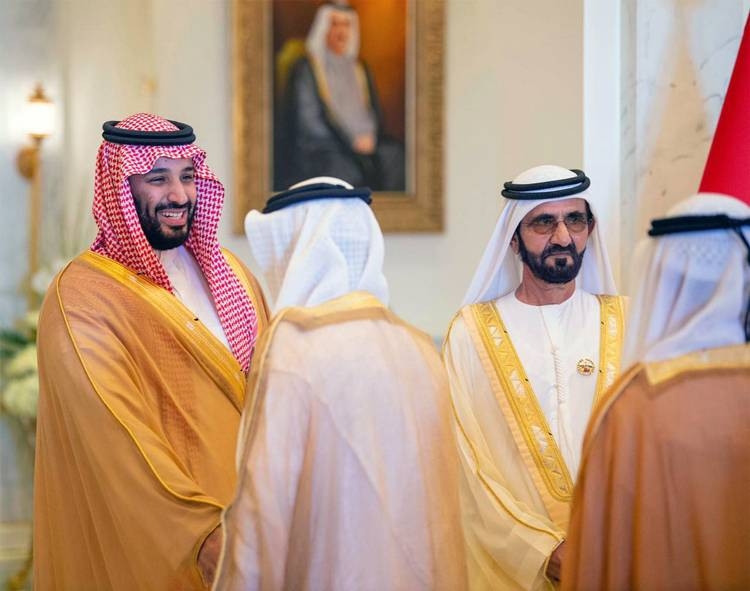 Crown Prince Muhammad Bin Salman, deputy premier and minister of defense, and UAE Vice President and Prime Minister and Dubai Ruler Sheikh Mohammed Bin Rashid are greeted by officials at the Zabeel Palace on Thursday.