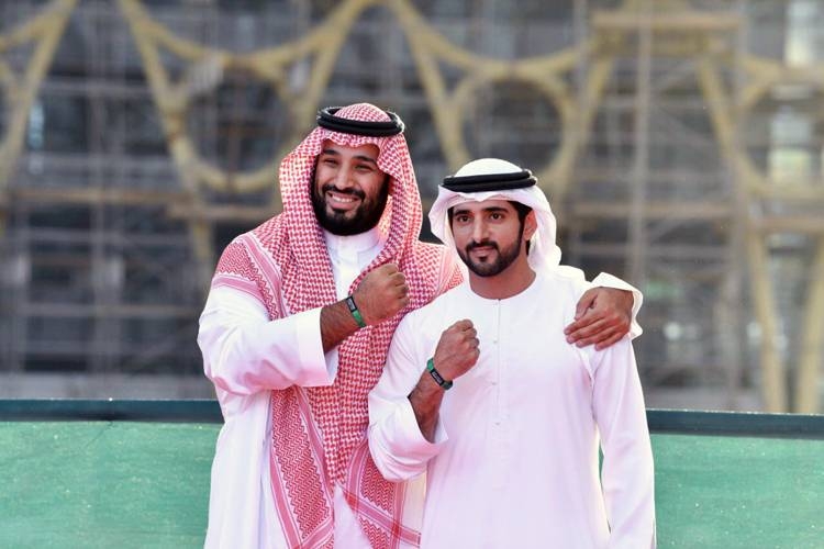 Crown Prince Muhammad Bin Salman, deputy premier and minister of defense, and UAE Vice President and Prime Minister and Dubai Ruler Sheikh Mohammed Bin Rashid are greeted by officials at the Zabeel Palace on Thursday.