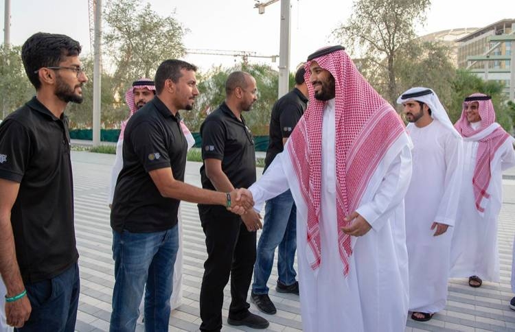 Crown Prince Muhammad Bin Salman, deputy premier and minister of defense, and UAE Vice President and Prime Minister and Dubai Ruler Sheikh Mohammed Bin Rashid are greeted by officials at the Zabeel Palace on Thursday.