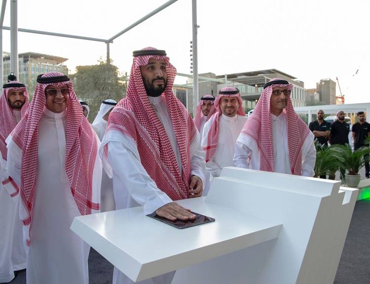 Crown Prince Muhammad Bin Salman, deputy premier and minister of defense, and UAE Vice President and Prime Minister and Dubai Ruler Sheikh Mohammed Bin Rashid are greeted by officials at the Zabeel Palace on Thursday.