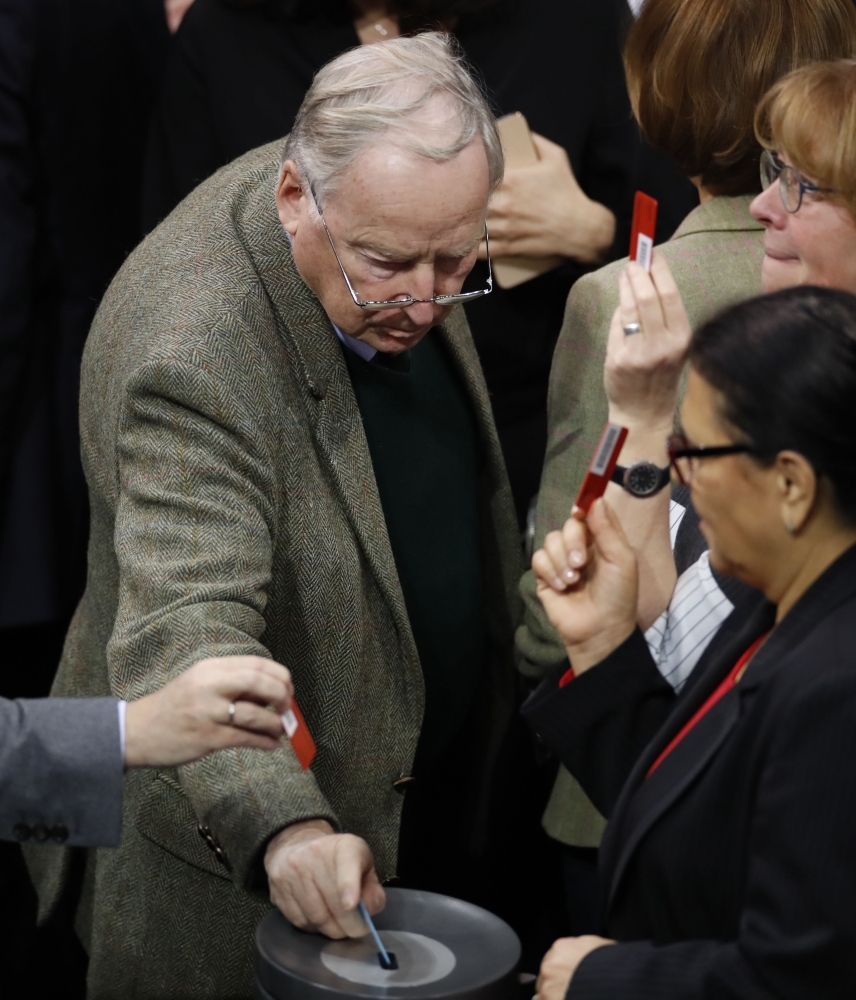 The co-leader of the parliamentary group of the Alternative for Germany (AfD) far-right party Alexander Gauland casts his vote on the federal 2020 budget following a debate at the Bundestag, the lower house of parliament, in Berlin on Friday. -AFP