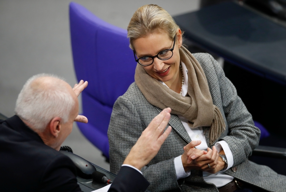 The co-leader of the parliamentary group of the Alternative for Germany (AfD) far-right party Alexander Gauland casts his vote on the federal 2020 budget following a debate at the Bundestag, the lower house of parliament, in Berlin on Friday. -AFP