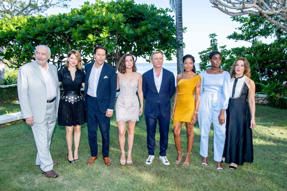 From left to right: Producer Michael G. Wilson with cast members Léa Seydoux, Cary Joji Fukunaga, Ana de Armas, Daniel Craig, Naomie Harris, Lashana Lynch and producer Barbara Broccoli attend the 'Bond 25' Film Launch at Ian Fleming's Home 'GoldenEye', in Montego Bay, Jamaica, in this April 25, 2019 file photo. — AFP