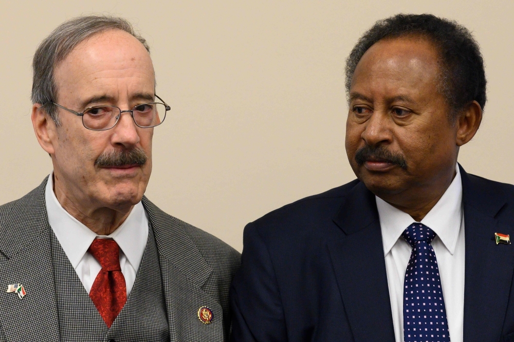 Sudanese Prime Minister Abdalla Hamdok, right, meets with House Foreign Affairs Committee Chairman Eliot Engel on Capitol Hill in Washington in this Dec. 4, 2019 file photo. — AFP